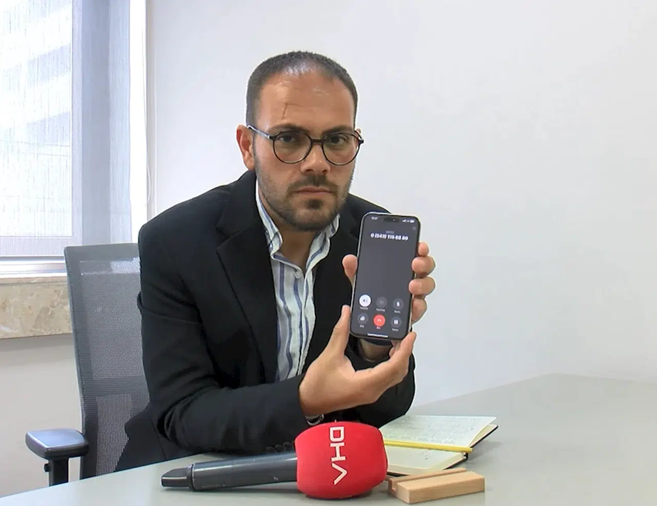 Telefonda gazeteciyi dolandırma girişimi kamerada