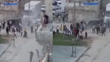 Araçla kalabalığın arasına daldı