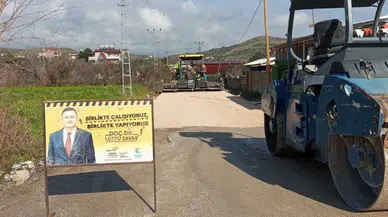 Hatay'da olumsuz havaya rağmen asfaltlamaya devam