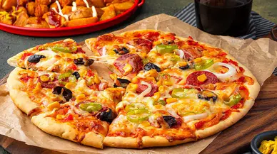 Artık dışarıdan siparişe son: Pizzacıları kıskandıracak ev yapımı Pizza tarifi