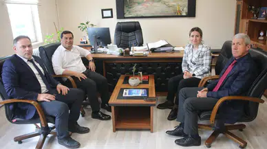 Kaymakam Altay'dan yeni Tapu Müdürü Sağlam Tenk'e ziyaret