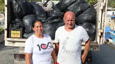 Marmaris'de Avcı çifti, koylarda 150 torba çöp topladı