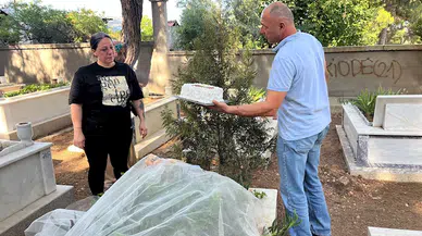 Öldürülen kızı İlayda'nın doğum gününü mezarı başında pastayla kutladı