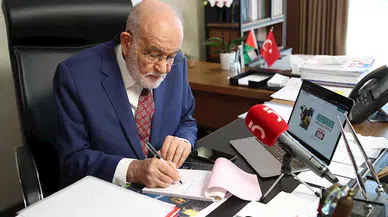 Temel Karamollaoğlu, kurban bağışını İMG'ye yaptı 