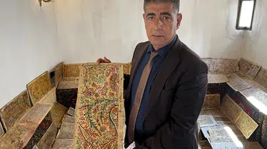 Babasından kalan 80 yıllık halı motiflerini unutturmamak için evinde sergiliyor