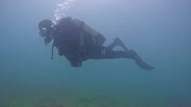 Kastamonu'nun Ginolu Limanı ve koyunda öğrencilerle dalgıçlar temizlik yaptı