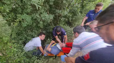 Yamaçtan yuvarlandı; itfaiye kurtardı