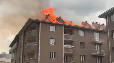 Ağrı'da 6 katlı binanın teras katında ekmek pişirmek için yakılan sobadan sıçrayan kıvılcım yangın çıkardı