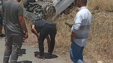 Emniyet kemeri takılı sürücü, takla atan otomobilden yara almadan çıktı