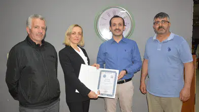 İspir Kaymakamı Poçanoğlu’ndan Tapu Müdürü Nalçak’a Veda