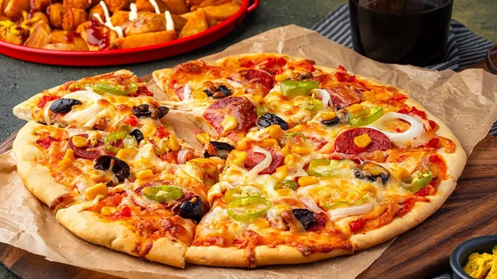 Artık dışarıdan siparişe son: Pizzacıları kıskandıracak ev yapımı Pizza tarifi