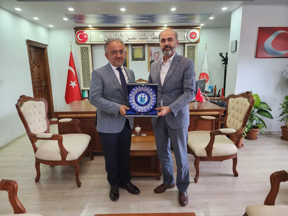 Rektör Mutlu Türkmen, Müftü Bayram Danacı